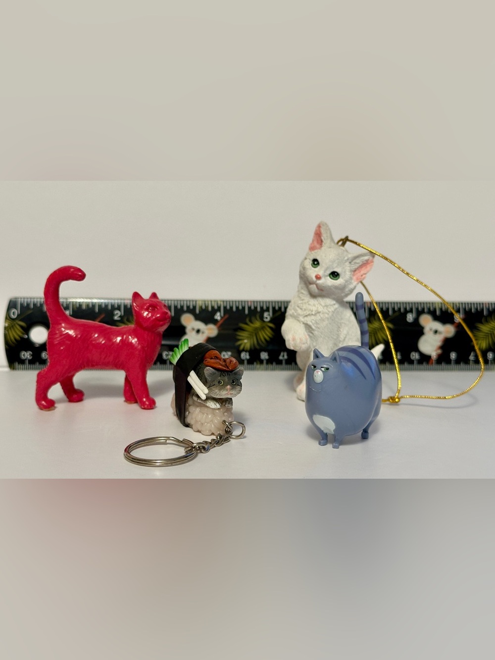 Lot of cat figurines CHLOE from Secret Life Of Pets and Why Am I Sushi Cat